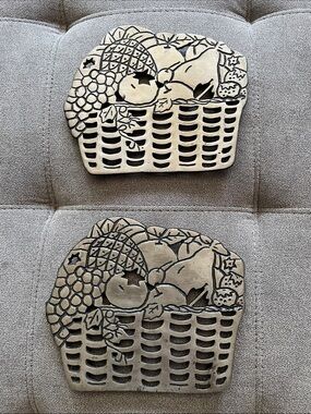 Metal fruit basket trivets.